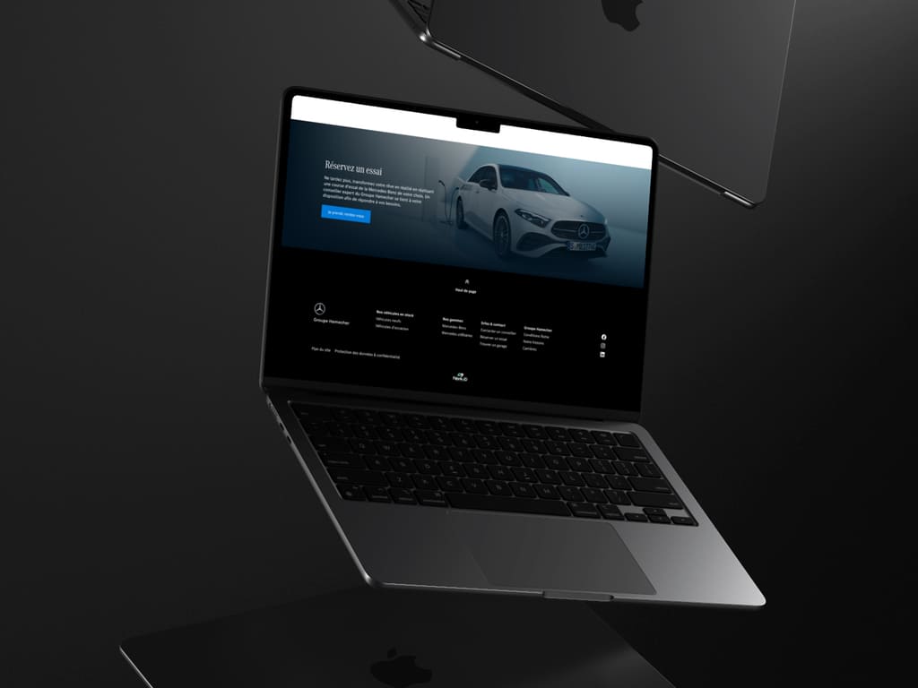 Ordinateur portable vue de face, montrant la page gamme du site concession Mercedes Benz